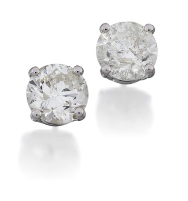Lot 2154 - A Pair of Diamond Solitaire Earrings