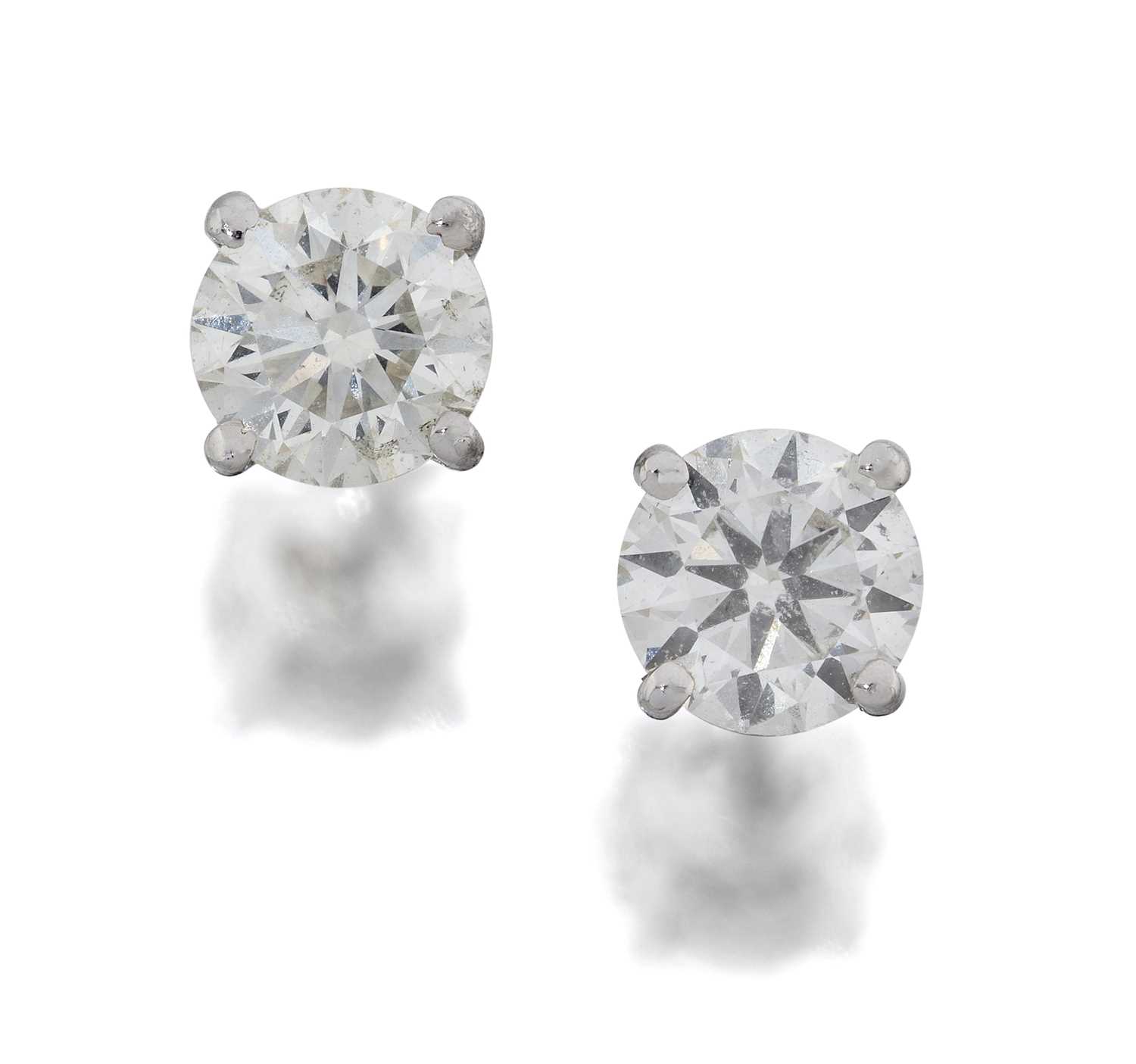 Lot 2029 - A Pair of Diamond Solitaire Earrings