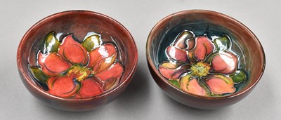 Lot 144 - Two Walter Moorcroft flambe Clematis dishes, 8....
