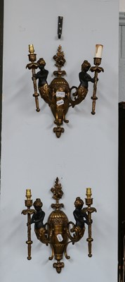 Lot 1123 - A pair of gilt and patinated figural twin...