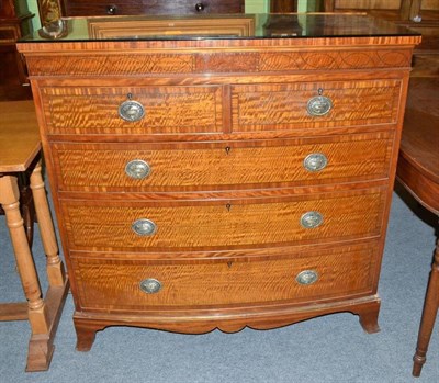 Lot 452 - An Edwardian mahogany bowfront four height chest by Waring & Gillows