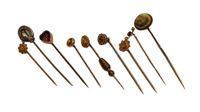 Lot 235 - Nine stickpins including three diamond...