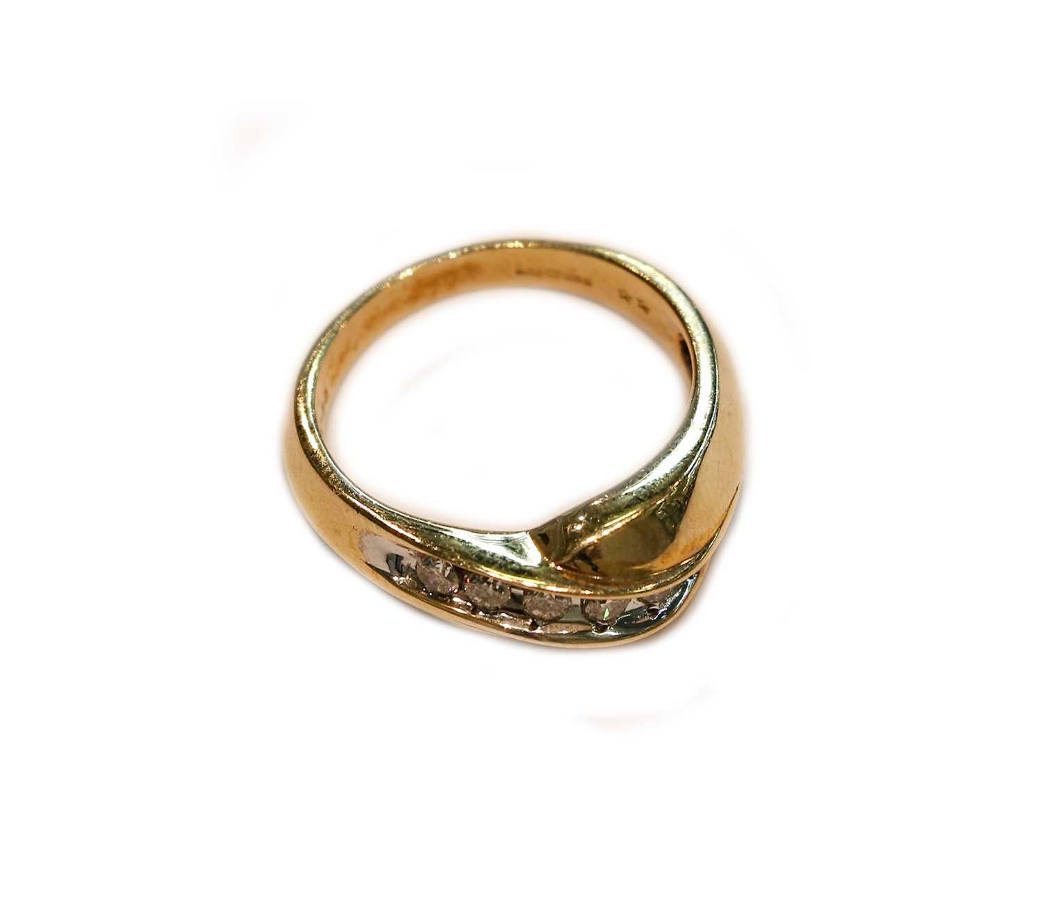 lot-252-a-9-carat-gold-diamond-crossover-ring