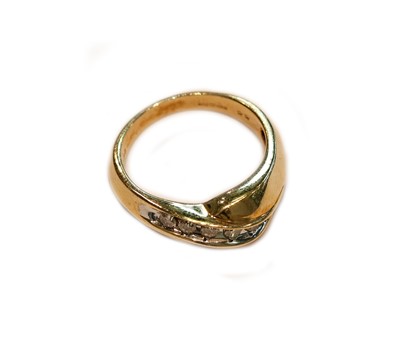 Lot 252 - A 9 carat gold diamond crossover ring, finger...