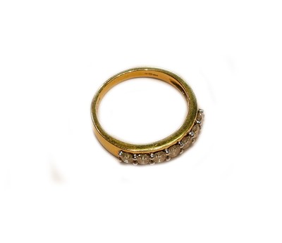 Lot 247 - An 18 carat gold diamond half hoop ring,...