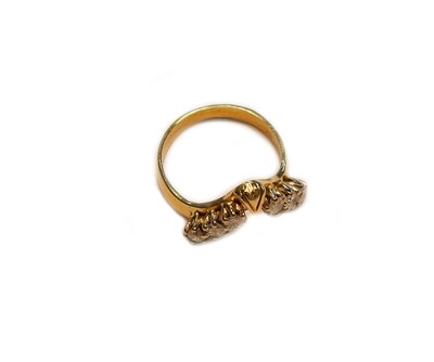 Lot 236 - An 18 carat gold diamond wishbone ring, finger...