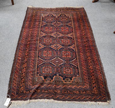 Lot 1006 - Baluch rug, the field of "Salor" guls enclosed...