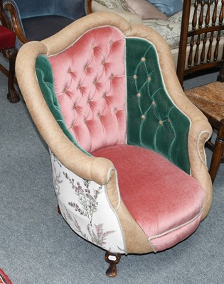 Lot 1091 - A Victorian buttoned armchair, later upholstered