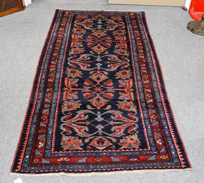 Lot 1010 - Hamadan rug, the indigo floral field enclosed...