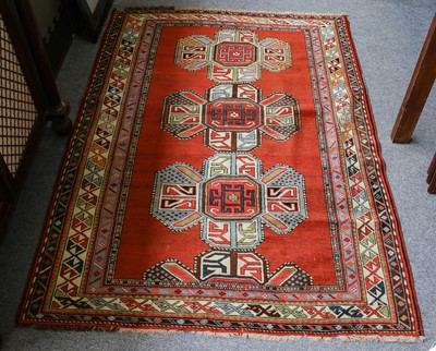 Lot 1012 - Karabagh rug, the terracotta field with three...