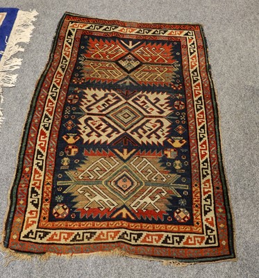 Lot 1018 - Kuba rug, the indigo field with three serrated...