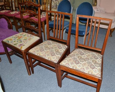 Lot 461 - An Edwardian inlaid rosewood nursing chair, a ladder back chair and a pair of slat back chairs (4)