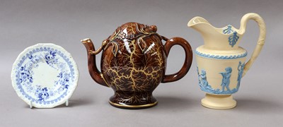 Lot 164 - A caneware jug, Cadogan teapot and a small plate