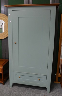 Lot 1076 - A modern blue painted single wardrobe fitted...