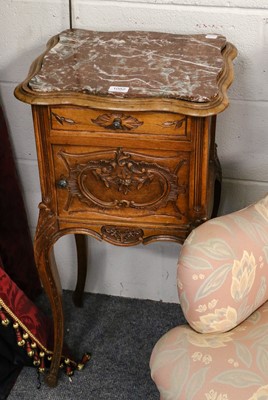 Lot 1082 - A French marble topped bedside table, fitted...