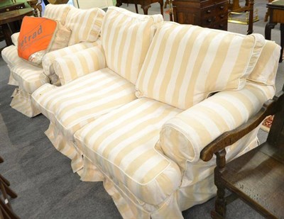 Lot 470 - Two two-seater sofas with spare covers