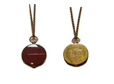 Lot 82 - A locket formed of carnelian and a George III...