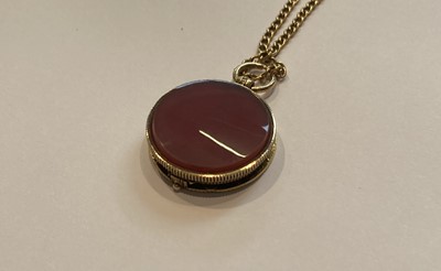 Lot 82 - A locket formed of carnelian and a George III...