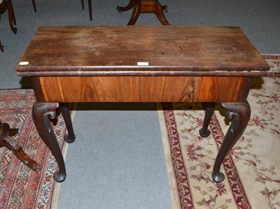 Lot 472 - An 18th century mahogany fold-over tea table, 91cm wide