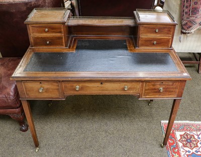 Lot 1277 - Edwardian inlaid mahogany desk with brass...