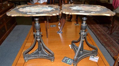 Lot 477 - A pair of Regency ebonised and parcel gilt tripod tables (poor order), 65cm high