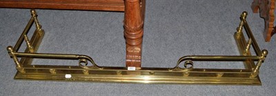 Lot 481 - A brass fender