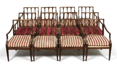 Lot 1225 - A Set of Twelve George III Style Mahogany Carver Dining Chairs, late 19th century, with swab...