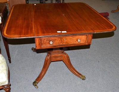 Lot 484 - A Regency mahogany pedestal Pembroke table