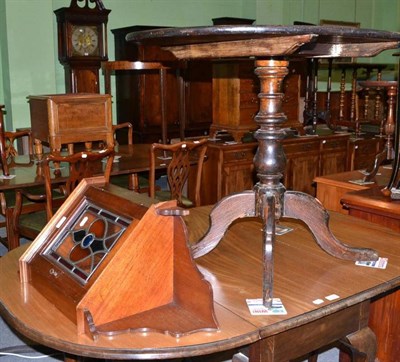 Lot 487 - A dark-stained oak pedestal table and an Edwardian mahogany small corner cupboard with leaded,...