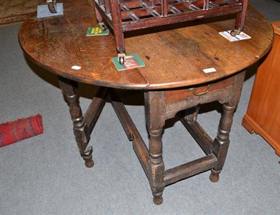 Lot 494 - 18th century oak gateleg dining table