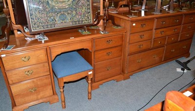 Lot 496 - A modern light wood dressing table with free-standing triple mirror, dressing stool and chest...