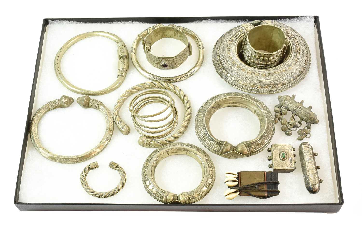 Lot 206 - A Collection of Omani/Bedouin Silver and White...