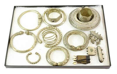 Lot 2419 - A Collection of Omani/Bedouin Silver and White...