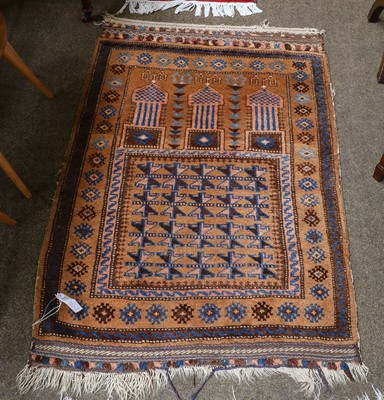 Lot 1220 - Balouch prayer rug, the field with three...