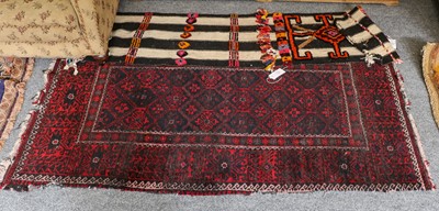 Lot 1207 - Mashad Balouch Rug. The lattice field enclosed...