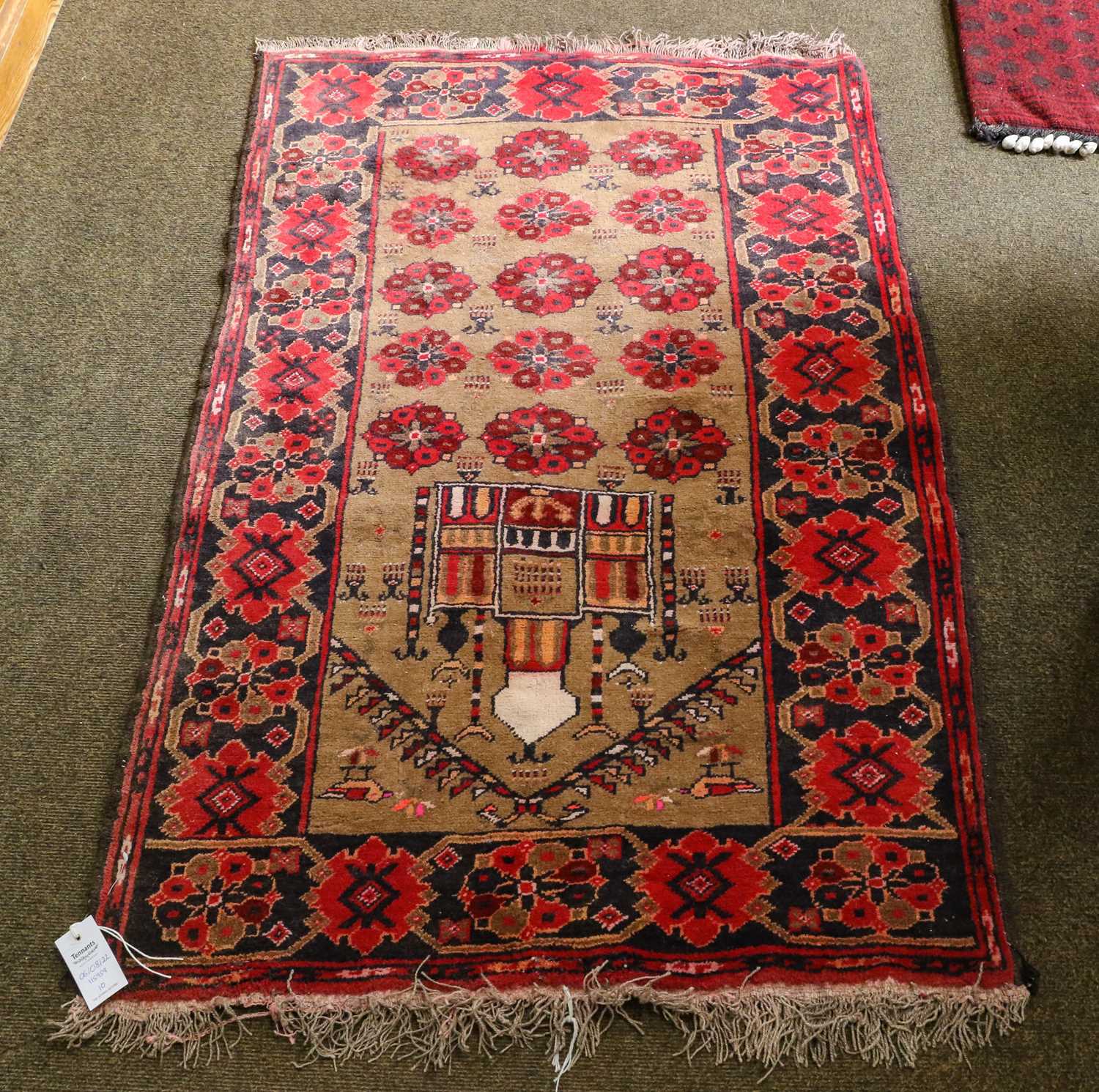 Lot 1092 - An Afghan Prayer Rug, the camel field with a...