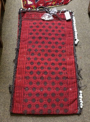 Lot 1075 - An Afghan Prayer rug, the field with mihrab...