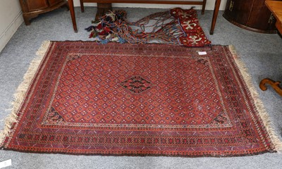 Lot 1208 - Afghan flat weave rug. The diamond lattice...