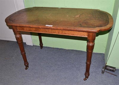 Lot 512 - A late Victorian walnut writing table