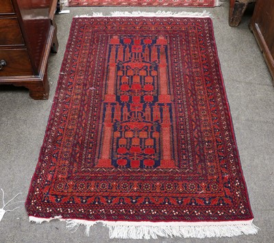 Lot 1074 - Afghan Prayer rug, the camel field with two...