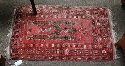 Lot 1074 - Afghan Prayer rug, the camel field with two...