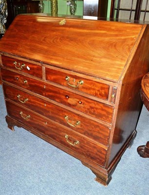 Lot 514 - George III mahogany bureau