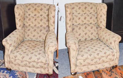 Lot 1251 - A pair of 1920's wing chairs