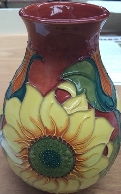 Lot 202 - Moorcroft pottery sunflower pattern vase