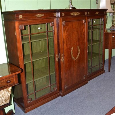 Lot 528 - An Empire-style mahogany breakfront bookcase with gilt metal mounts