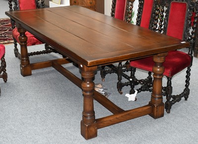 Lot 1268 - A 20th century oak refectory table 212cm by...