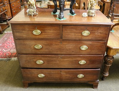 Lot 1345 - A George III mahogany chest of two short over...