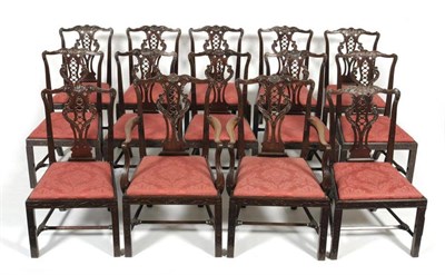 Lot 1230 - Fourteen Chippendale Revival Dining Chairs, late 19th century, with acanthus carved top rails,...