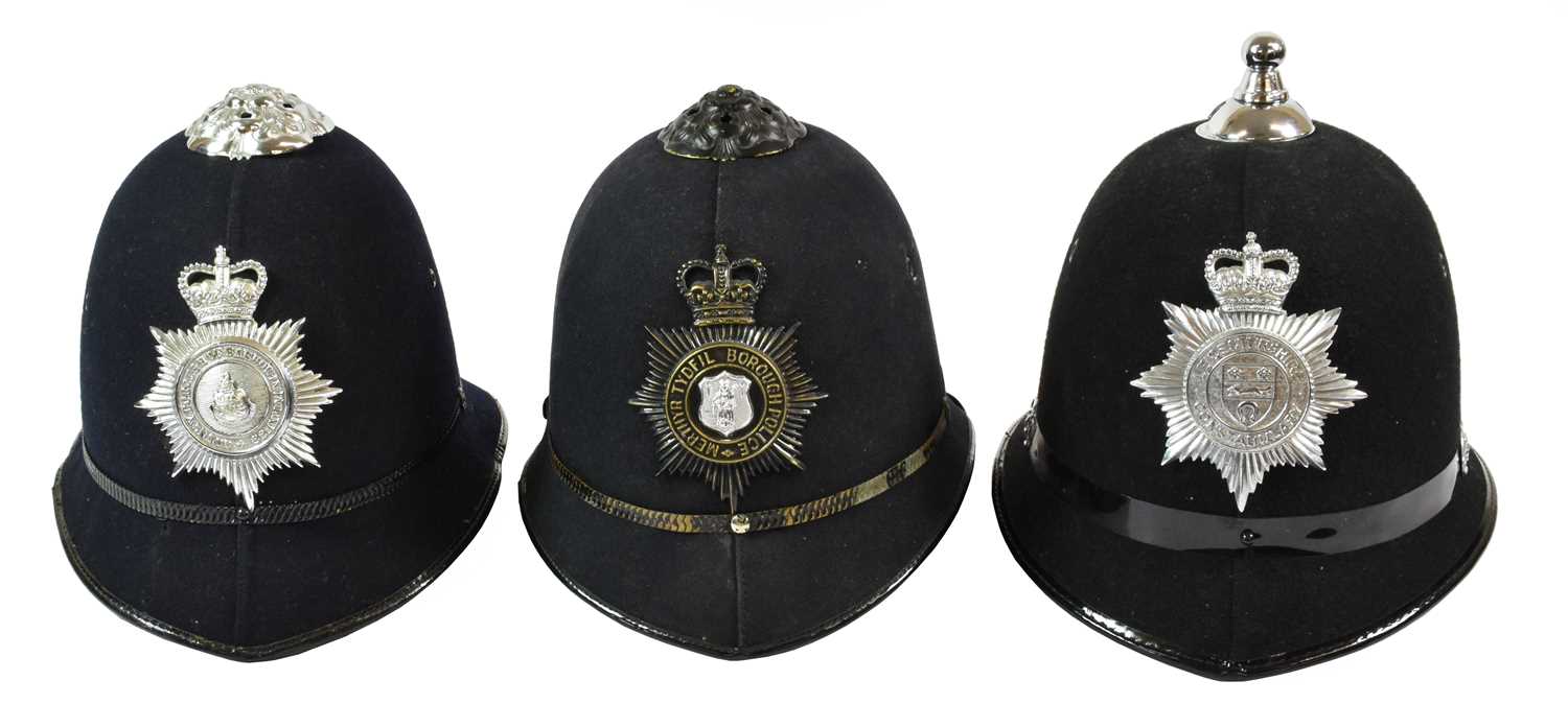 Lot 2203 - Two Rose Top Police Helmets, each of black...