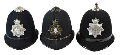 Lot 2203 - Two Rose Top Police Helmets, each of black...